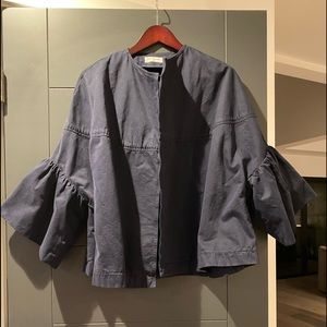 Navy blue soft denim with flared ruffle sleeves